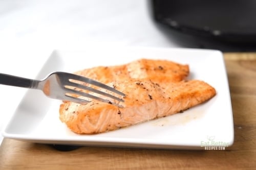 salmon pierced with fork