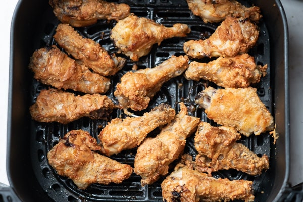 Air fried chicken wings in basket