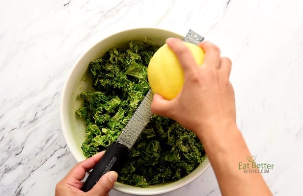 Zesting Lemon over the salad