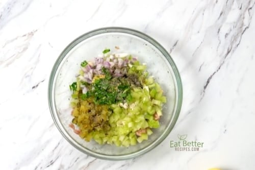 Tuna salad ingredients in a bowl